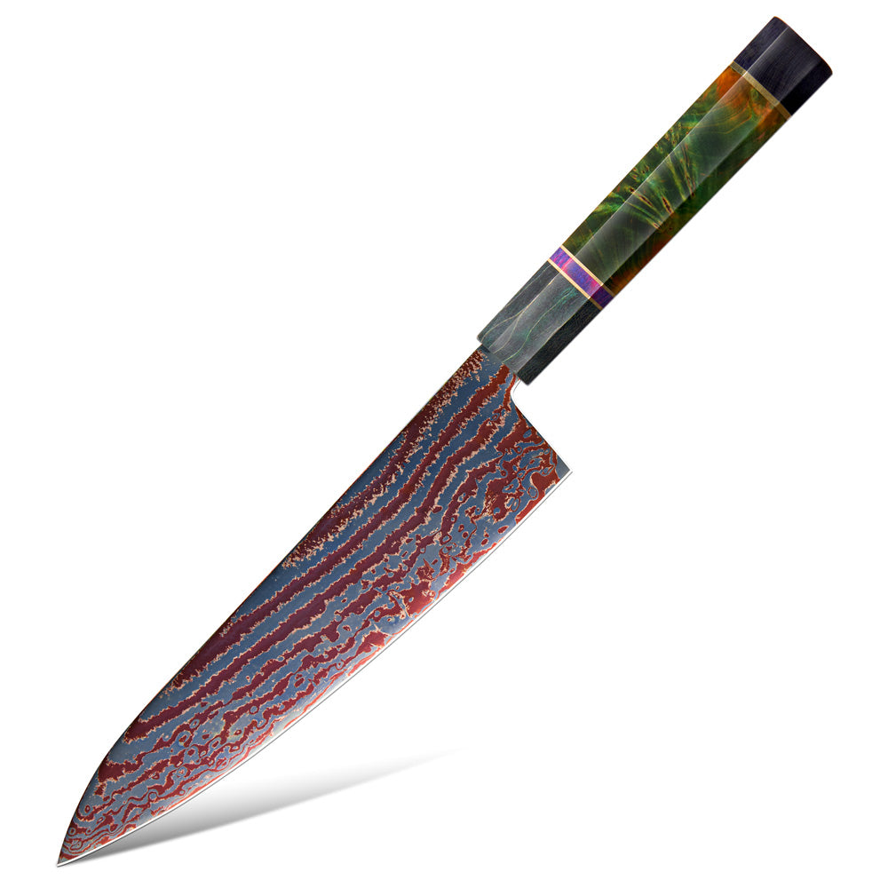Decorative knife with a patterned blade and handle on a white background